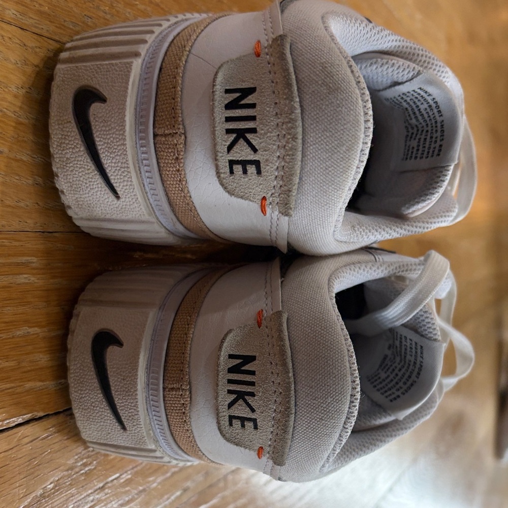 Nike White Low-Top Sneakers with Black Swoosh and Gold Accent - Picture 7 of 15